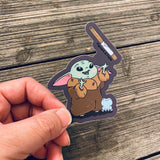 baby yoda and churro vinyl sticker