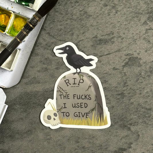 Sticker of a raven or crow on a tombstone that reads RIP the fucks I used to give